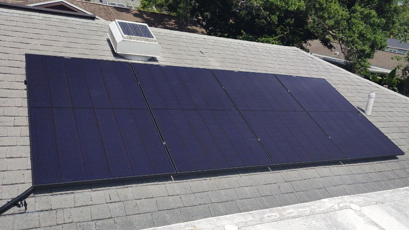 REC solar panels installed on a shingled Florida roof